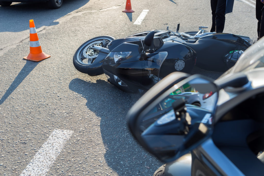 broken-motorcycle-road-accident